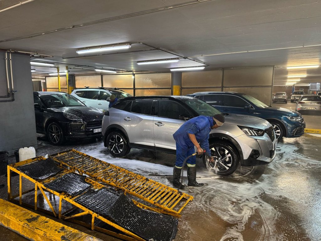 Professional WashTime team cleaning a commercial vehicle